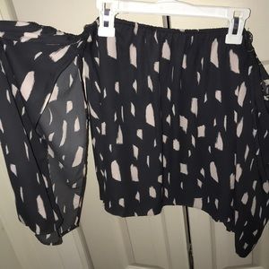 Buddy Love across the shoulder top